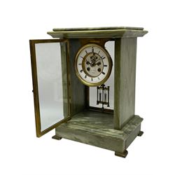 Henry Marc - Early 20th century 8-day French art deco mantle clock c1910, in a green mottled marble case with a stepped flat top and deep moulded plinth, brass framed bevelled front and rear glass doors, two part enamel dial with a visible Brocot deadbeat escapement and pendulum regulation, steel moon hands and Roman numerals, Parisian twin train rack striking movement with a visible twin file mercury pendulum, striking the hours and half-hours on a bell.