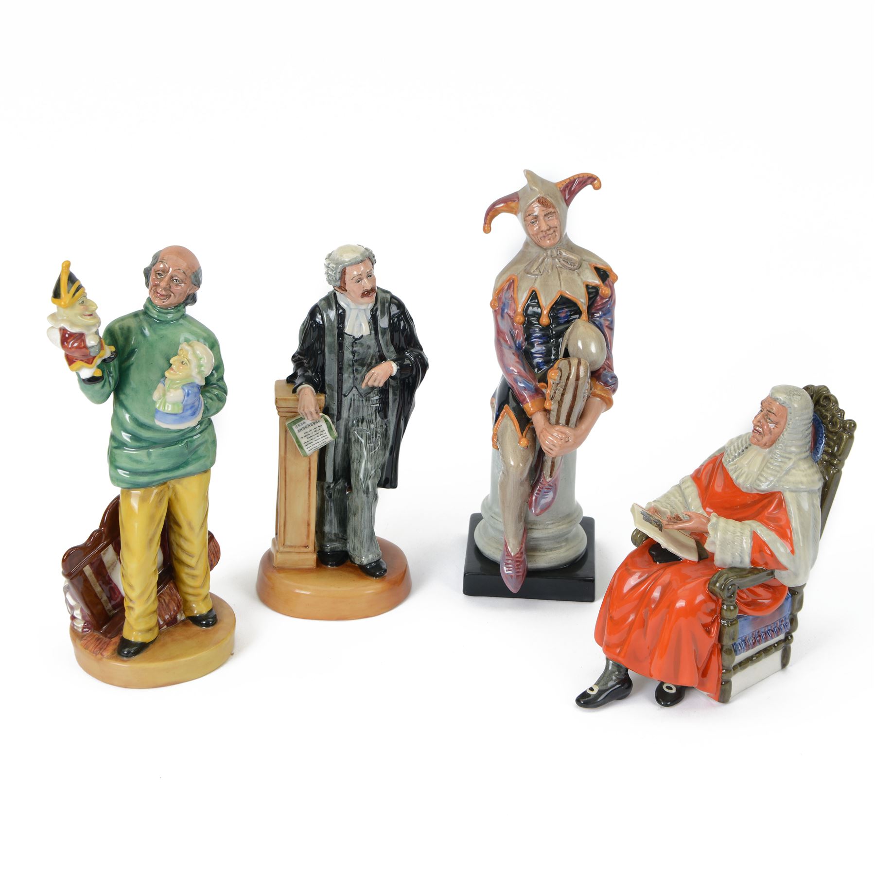 Four Royal Doulton figures, comprising The Judge HN2443, The Lawyer HN3041, Punch and Judy Man HN2765 and HN2016 