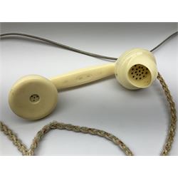 A Vintage cream Bakelite telephone, with lower drawer and plaque inscribed Call Exchange, H14cm.