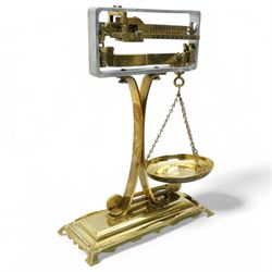 Set of brass balance scales on platform base 