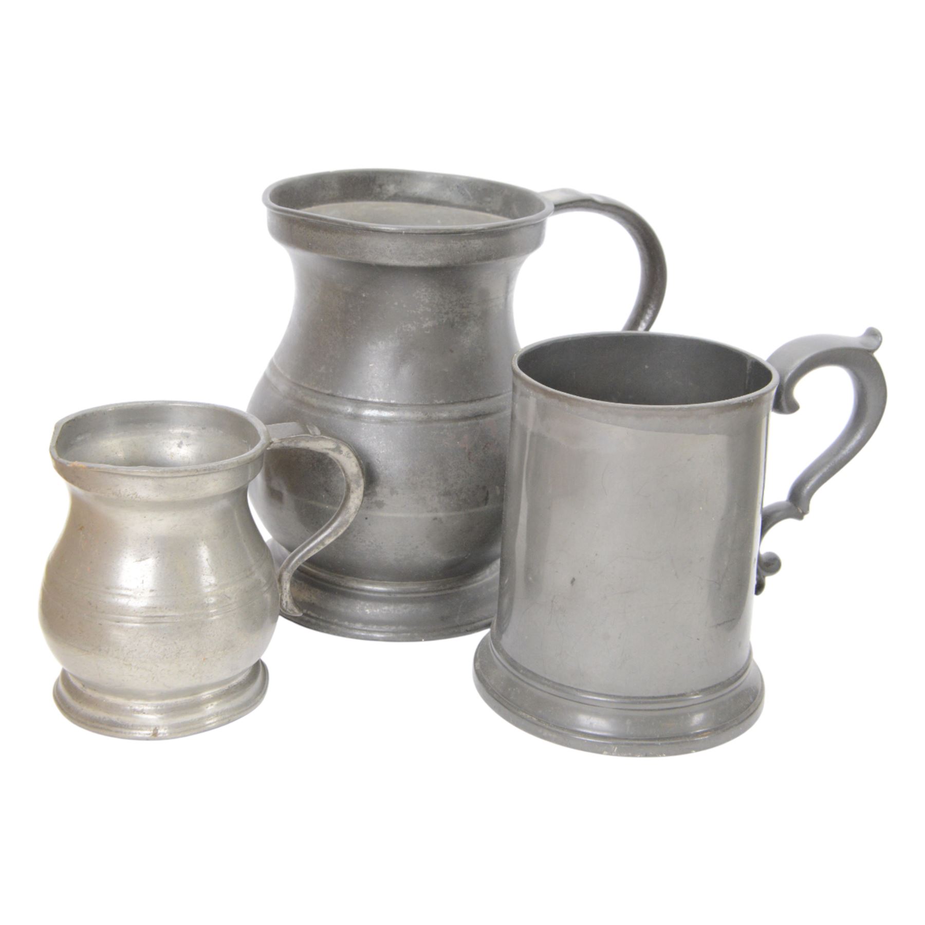 19th century Pewter tavern jug, with WR beneath a crown touch mark, together with pewter tankards and measures  