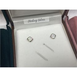 Eight pairs of silver and silver stone set earrings, all boxed