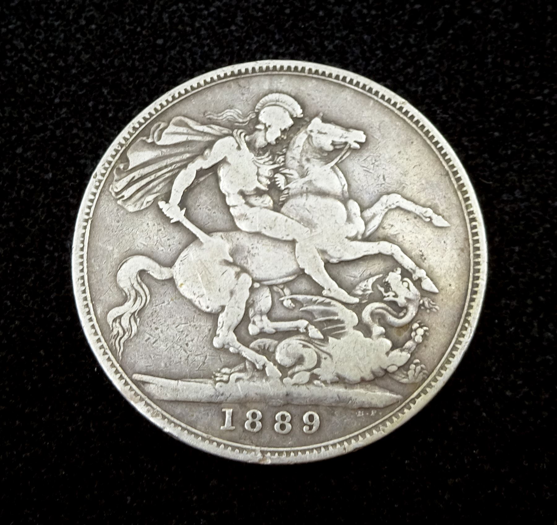 Edwardian silver sovereign holder by A & J Zimmerman Ltd,  Birmingham 1902, silver whistle by John Bettridge, Birmingham 1824, pair of silver knife rests by Josiah Williams & Co, London 1919, silver cheroot holder, Victorian 1889 silver crown, pill box and a silver Middle Eastern embossed mount