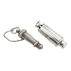 Edwardian silver whistle by William Hornby, London 1902, the metal interior stamped Huloons patent and a Victorian silver whistle, in a silver reeded case by Joseph Jennens & Co, Birmingham 1863