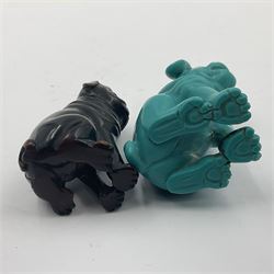 Four carved wood and composite netsuke, modelled as mouse on a basket of mushrooms, signed, dog with puppies, signed, seated pug and a composite turquoise-coloured seated pug, signed, largest H5cm (4)