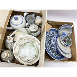 Collection of oriental ceramics, including teapot, jugs and two tea cups and saucers,  blue and white porcelain plate with scalloped edges, tea wares with crane and floral decoration including two tea pots, milk jug sugar bowl etc. 