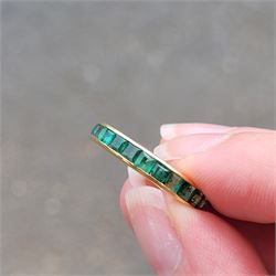 18ct gold emerald full eternity ring, channel set with calibre cut emeralds