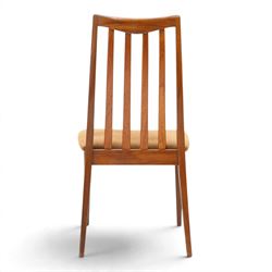 G Plan - Mid 20th century teak extending dining table and four chairs, oval top with stowed fold-over leaf extending to 208cm, raised on two shaped supports united by a stretcher 