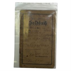 WWI German family grouping ephemera, including photographs, hand written postcards, military passport, Military Anti tank training book  