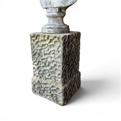 Roman Neoclassical style cast stone bust, weathered finish, raised on textured stone plinth of tapering form
