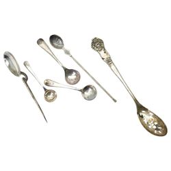 Two silver napkin rings, silver mirror frame and various silver spoons