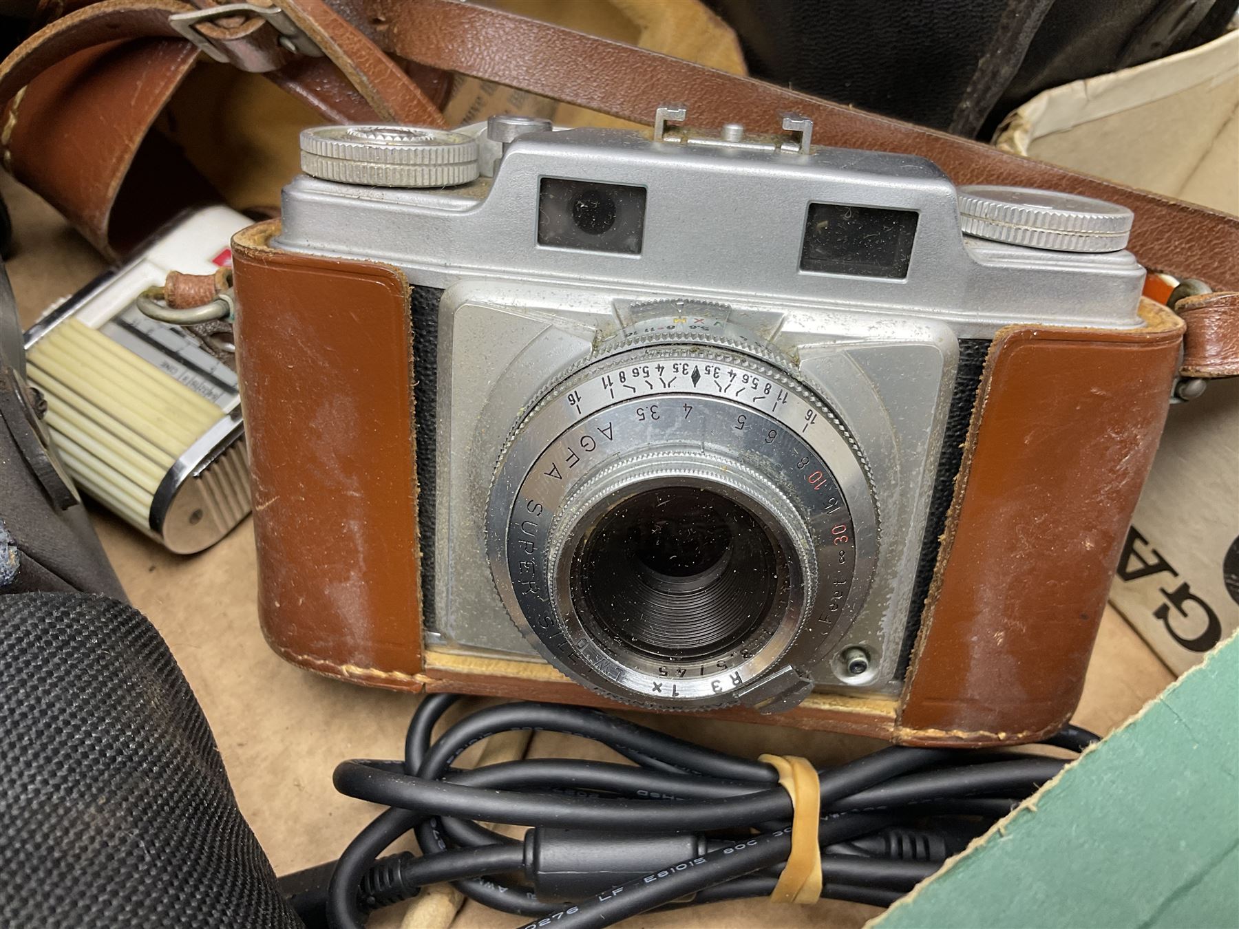 Collection of camera and equipment, to include Canon PowerShot S500, Cosmic 35, polaroid 320, etc, in two boxes  