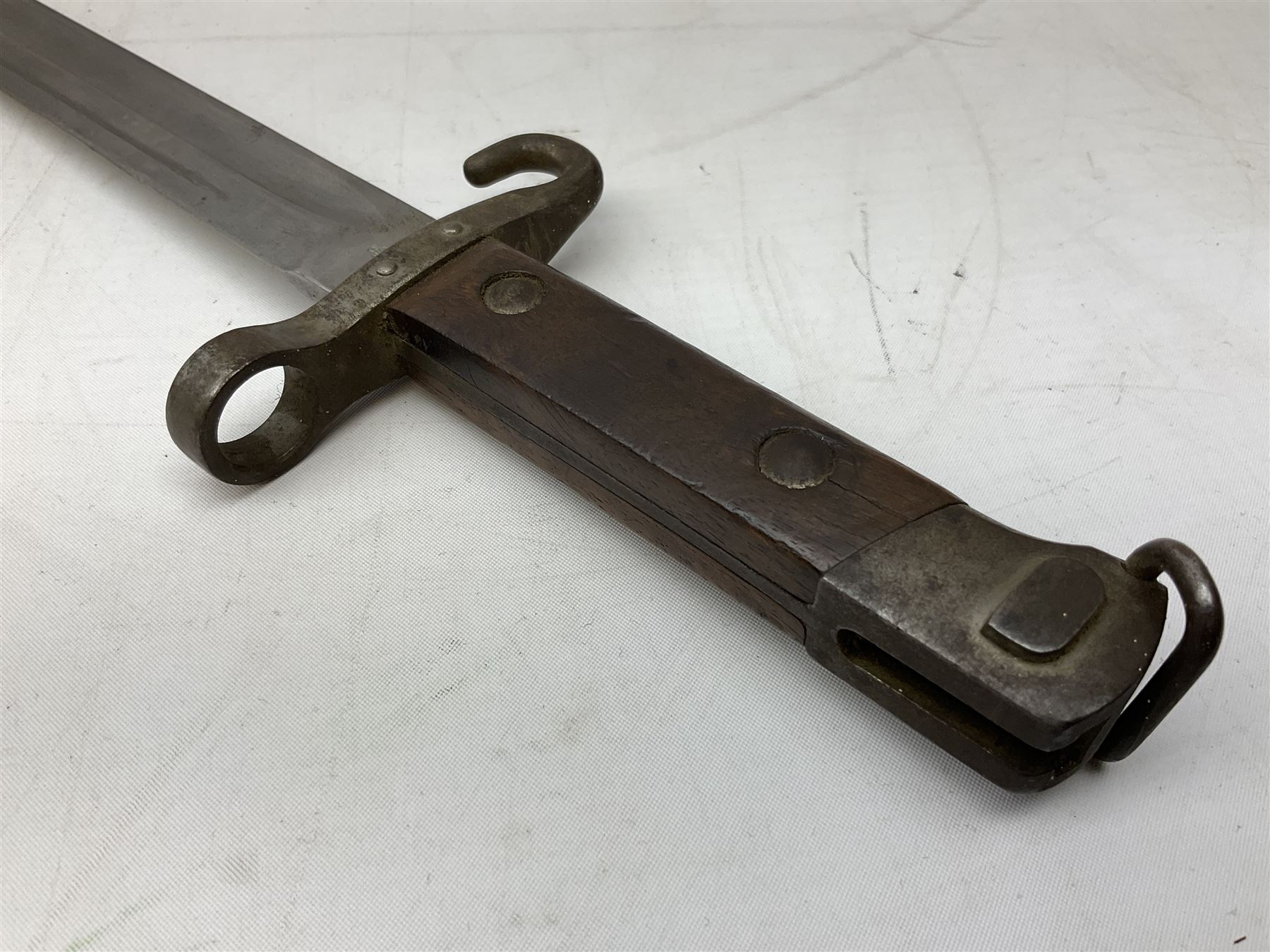 Austrian Model 1895 carbine NCO's knife bayonet with 25cm fullered steel blade; in steel scabbard with webbing frog L39cm overall; and Spanish Model 1941 Bolo bayonet with 25cm fullered steel blade No.6412D; in steel scabbard (2)