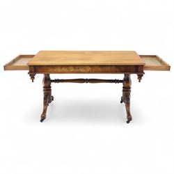 Mid Victorian walnut library table, plain top of rectangular form with moulded edge above frieze fitted with opposing drawers, table supported on a pair of turned and hexagonal carved baluster end standards, united by a turned stretcher terminating in scrolling sabre legs carved with acanthus and floral details, resting on ceramic castors, circa 1860