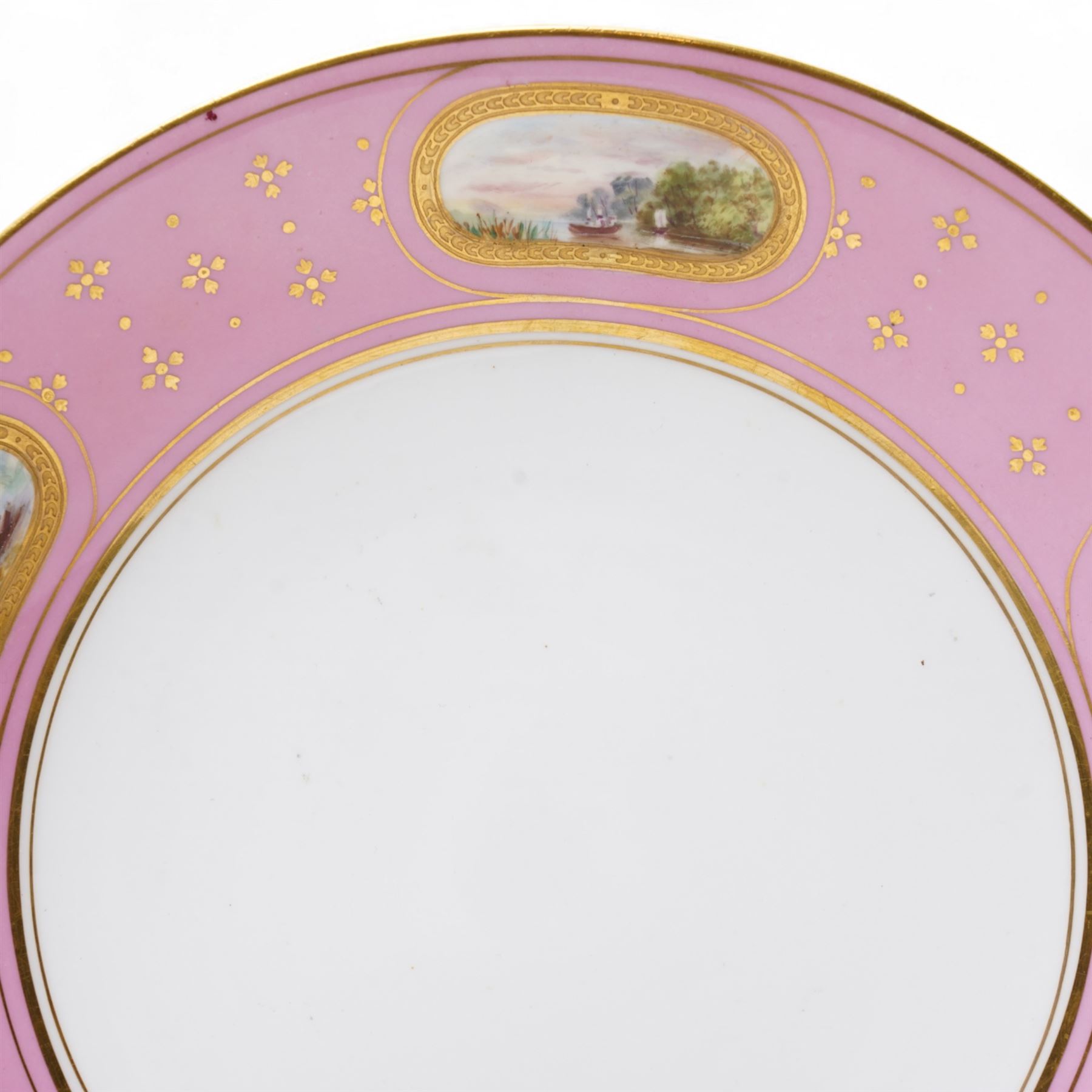 Pair of Victorian Minton plates, the pink borders painted with small landscape panels D24cm