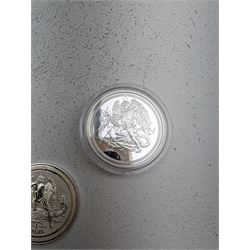 Three Queen Elizabeth II Isle of Man one ounce fine silver coins, comprising 2016, 2018 one angels and 2018 one noble 