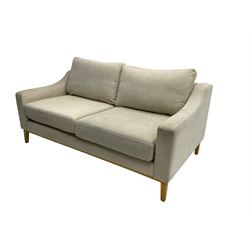 Noble & Jones - three seat sofa, upholstered in a beige fabric, square tapering supports (W224cm) and a matching two seat sofa (W185cm)