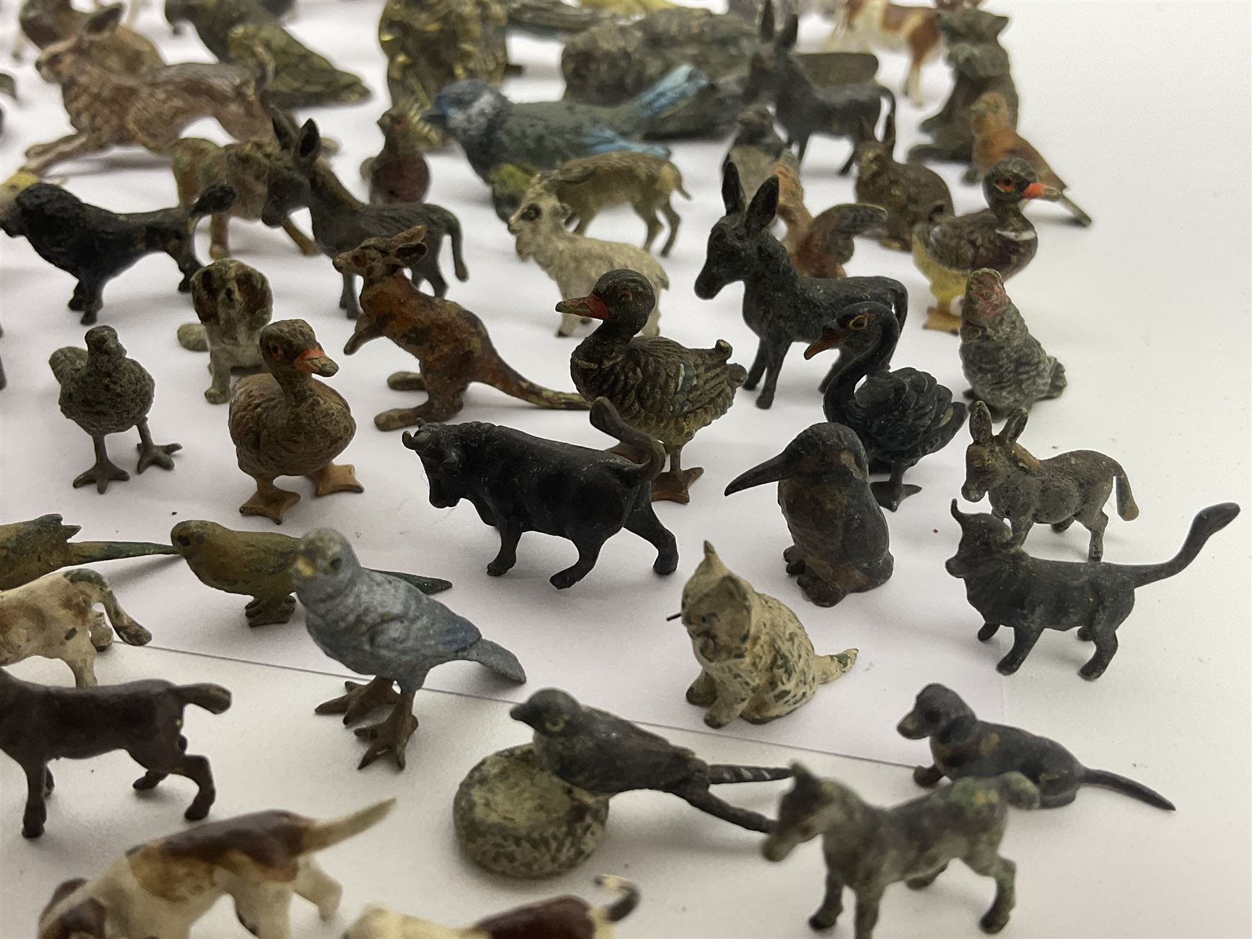 Collection of miniature cold painted bronze and similar animals, to include birds, sheep, horses etc 