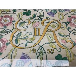 Two 1950s tapestries, the framed example celebrating the 1953 coronation, the second converted into a fire screen depicting a floral display, firescreen H70cm (2)