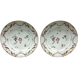 Pair of 18th century famille rose Chinese glazed porcelain plates with floral and foliate decoration, D23cm. 