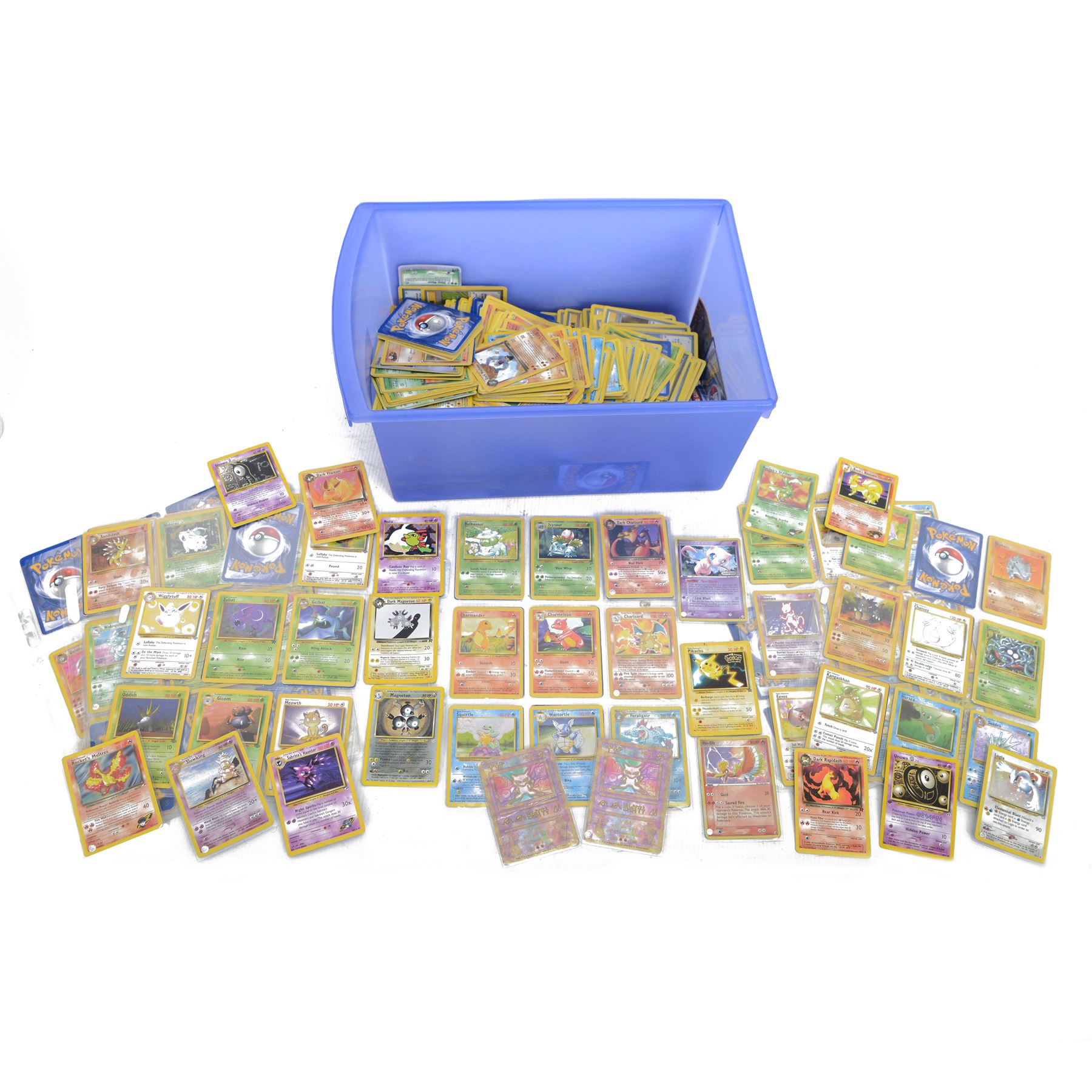Collection of mainly vintage Pokemon cards including Charizard Base Set Holographic number 4/102 and two Ancient Mew 2000 promo cards, some housed within plastic wallets and some loose