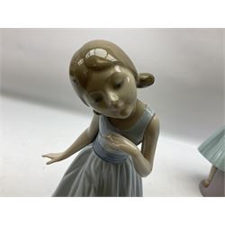 Four Lladro figures, comprising After the Dance no 5092, A Dance Partner no 5093, Ballerina First Steps no 5094 and Ballet Bowing no 5095, all in original boxes, largest example H28cm