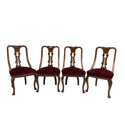 Set four late 19th century walnut chairs, the shaped cesting rail over scroll carved and pierced splat, upholster sprung seats, on cabriole front supports