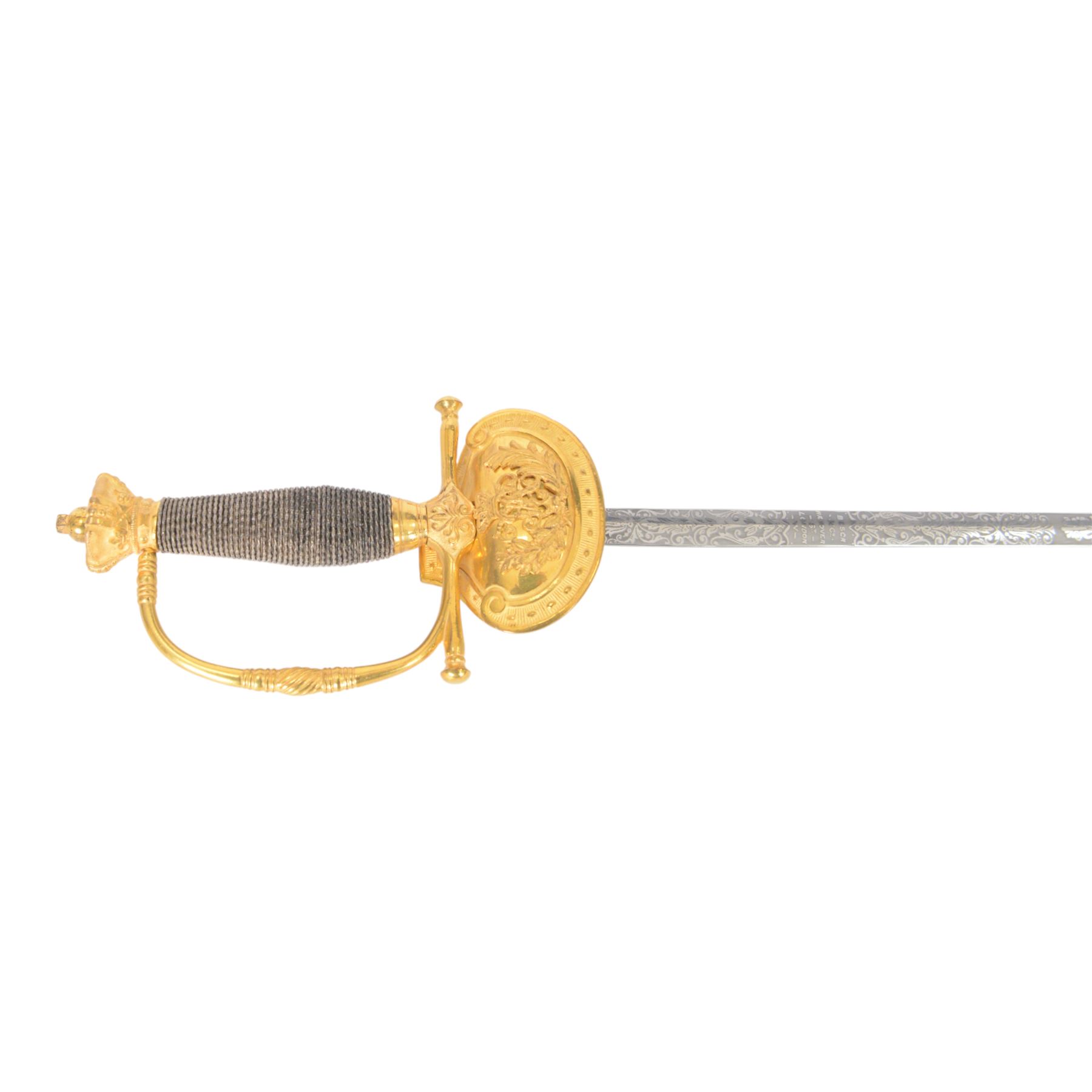 British Victorian court sword, for members of the Royal Household, by W.K & C of Solingen and retailed by Besch of Hanover St London, the 80cm blade etched to both side, the single bar hilt of gilt brass with Queens' crown pommel and downturned shell guard with the monogram of Queen Victoria, the wooden grip covered with silver wire, within leather scabbard with three gilt brass mounts and twin suspension rings, overall L96cm   