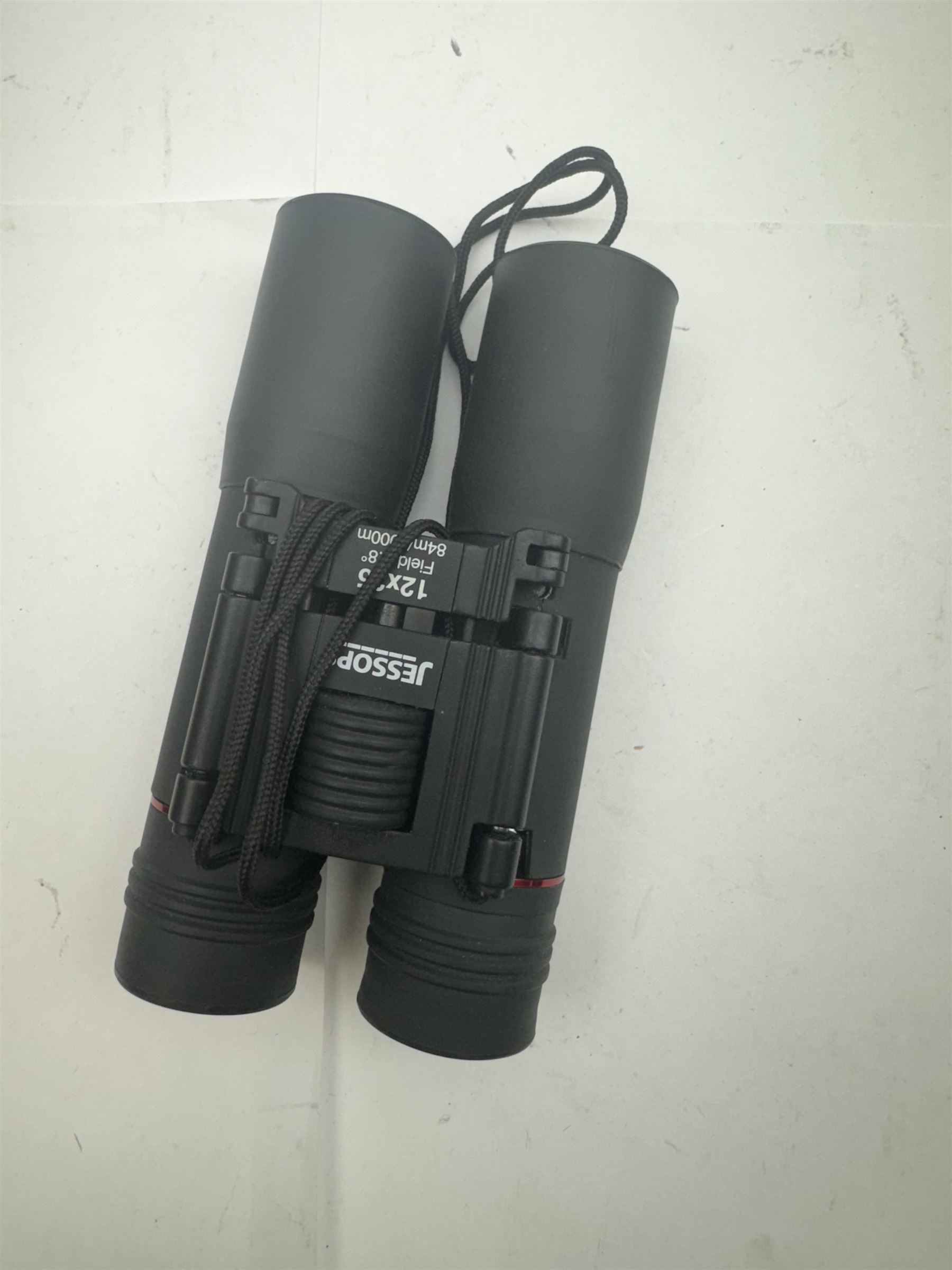 Four pairs of binoculars, to include Carl Zeiss Jena Jenoptem 8x30W serial no. 3750814, Nikon Sporting II 8x40 serial no. 604672, Minolta Pocket II 8x22 Field 7 and Jessops 12x25 Field 4.8 84m/1000m, all in carrying cases 