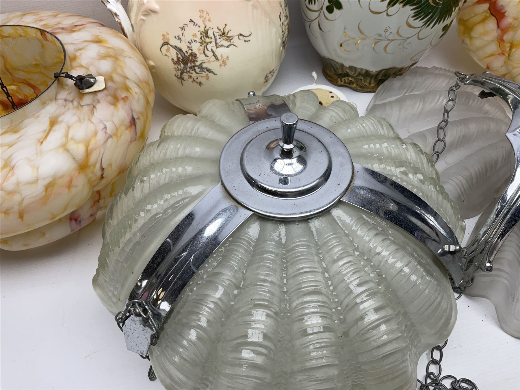 Two Art Deco mottled glass fly catcher ceiling light shades, together with two other 1930s moulded glass ceiling light shades and two Victorian style wash jugs, largest shade D33cm