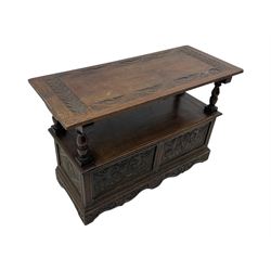 Late 19th century oak monk's bench, the hinged back or top carved with mythical winged dragons, central cartouche and scrolling acanthus leaves, on turned supports, hinged box seat revealing storage, the panelled front matching the back, shaped bracketed skirt carved with shell and scrolled leafage