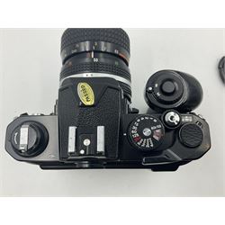 Nikon FM2n camera body, serial no. N8683100, with 'Nikon Zoom-NIKKOR 35-70mm 1:3.3-4.5' len, serial no. 2236565, Nikon MF-16 data back, serial no. 212905 and Nikon MD-12 Motor Drive, serial no 1570382 