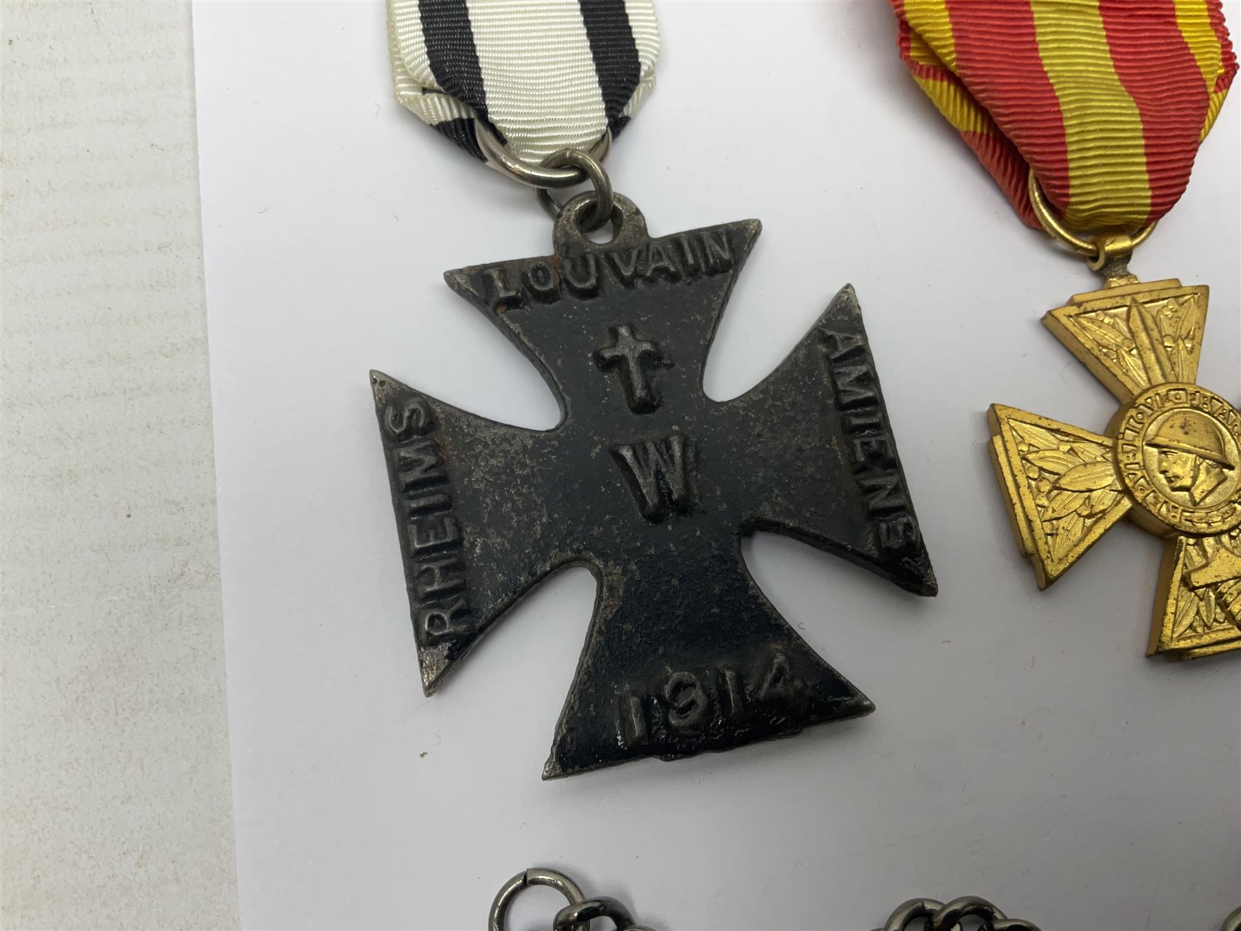 RAOB jewel Bourn Lodge 9394 with 25 years bar; two masonic jewels and triangular pendant watch; British Iron Cross style propaganda medallion; French Legion of Honour and Combatants Cross; and three foreign medals
