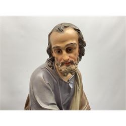 Two religious painted plaster figures of Mary and Joseph kneeling on oval plinths, with impressed mark 'Raffl et Cie Paris', H60cm 