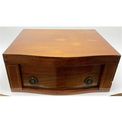 Late 19th/early 20th century composite canteen of silver flatware, contained within an early 20th century mahogany serpentine fronted case with twin drop carry handles, and hinged cover with boxwood stringing and central inlaid shell motif, above a single drawer with twin ring handles and Wellington style locking system, the cover and drawer opening to reveal plaque for Spink & Sons Ltd London, and fitted interior containing ivory handled knives, ivory handled carving set, and silver Hanoverian and Old English pattern cutlery, each with engraved monogram to terminal, hallmarked London, makers Spink & Son (John Marshall Spink), Goldsmiths & Silversmiths Co, and Chawner & Co (George William Adams), various dates ranging 1880-1923, gross weighable silver 92.59 ozt (2880 grams)