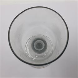 Three 18th century wine glasses comprising a plain stemmed glass with bell shaped bowl and conical folded foot H16cm, another plain stemmed glass with ogee bowl and folded foot and a Continental glass with gilt faceted bowl, decorated with male figure within a landscape, on a clear Silesian seven sided cut stem (3)