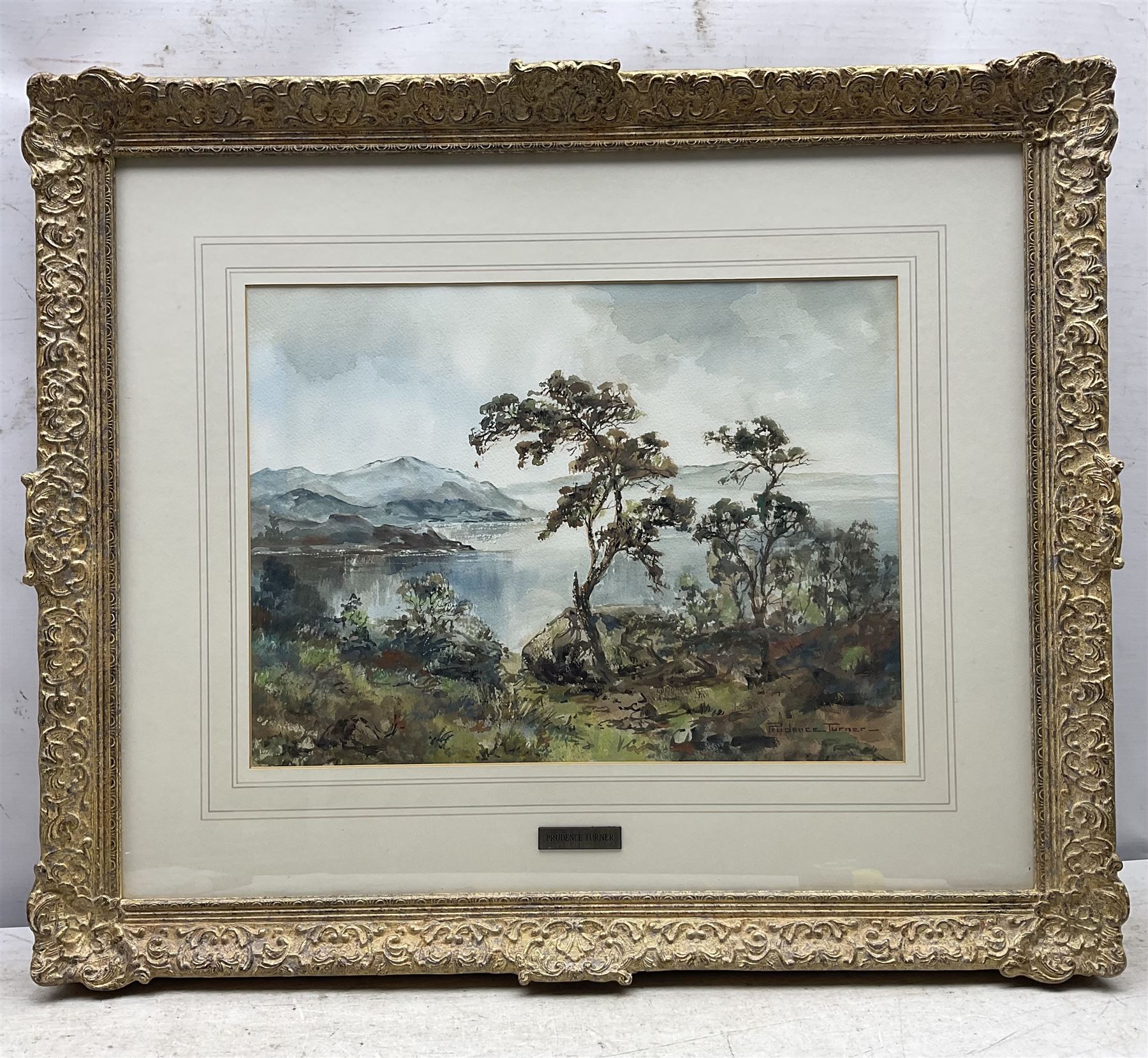 Prudence Turner (Scottish 1930-2007): Trees Beside the Water, watercolour signed 29cm x 39cm