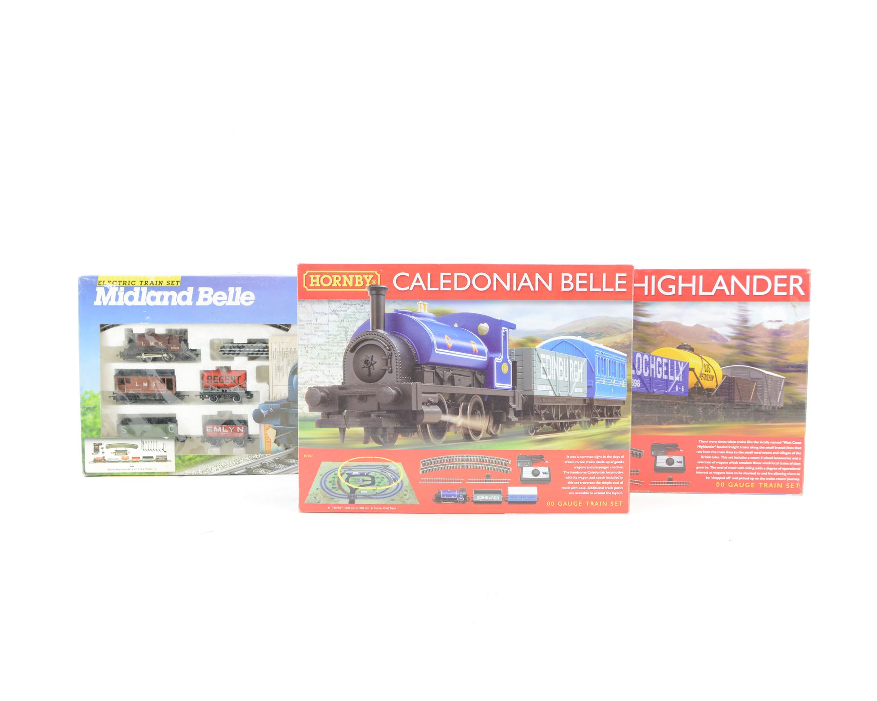 Three Hornby '00' gauge train sets, comprising R1157 'West Coast Highlander', R692 'Midland Belle' and R1151 'Caledonian Belle', all boxed 