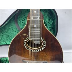 Eastman eight-string mandolin model MD504, serial no.140435406, L66cm; in TGI hard carrying case; together with case of instructional CDs