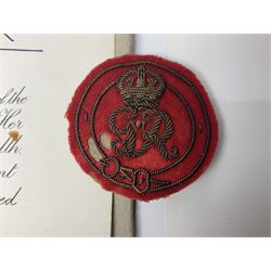 George VI Knight of the Garter cloth beret insignia with pin back and photograph of the Knight's Robes; Edmund Fellowes book on The Knights of the Garter 1348-1939; together with EIIR civilian OBE certificate to Jeffery Stanford Agate with facsimile signatures of Elizabeth II and Prince Philip