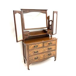 Late Victorian walnut triple mirror back dressing chest, two trinket drawers above two short an two long drawers, shaped apron, square tapering supports 