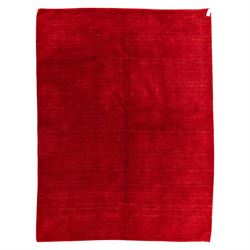 Indian hand-knotted wool Gebbeh design carpet, of rectangular form, woven in a rich madder red tone
