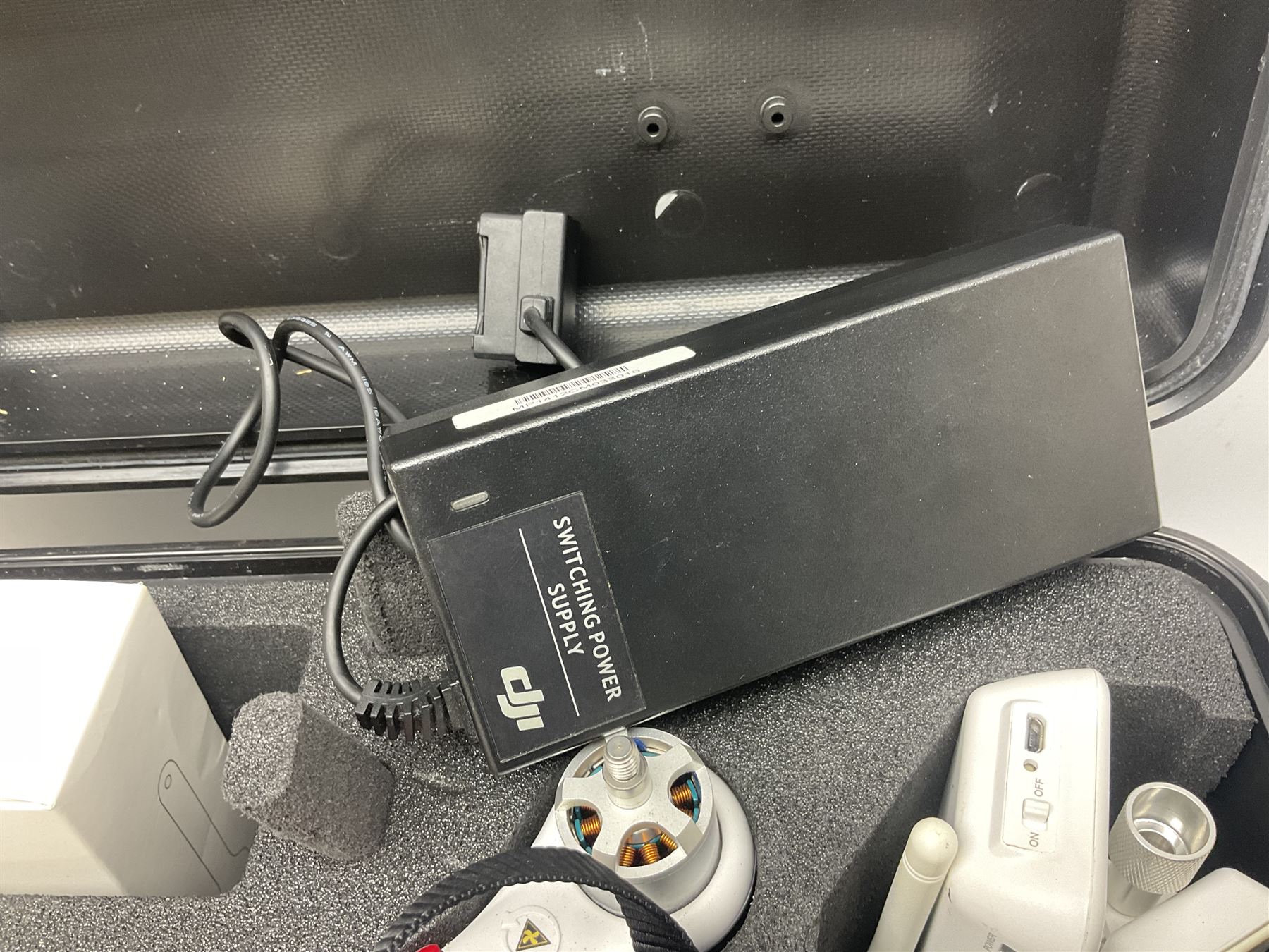 DJI Phantom 2 Vision Plus 3.0 drone, with controller, battery pack, blades, chargers and other accessories in fitted foam lined hard plastic case