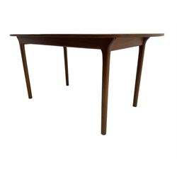 AH McIntosh & Co of Kirkaldy - mid-20th century teak extending dining table, rectangular top with rounded corners, concealed integrated double leaf, raised on tapered supports, 'Furniture by McIntosh sticker to underside of leaf