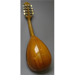  Italian lute back mandolin, with segmented rosewood back, cross-banded spruce top with tortoise shell plate, ivorine inlaid fretboard and pegs, L63cm   