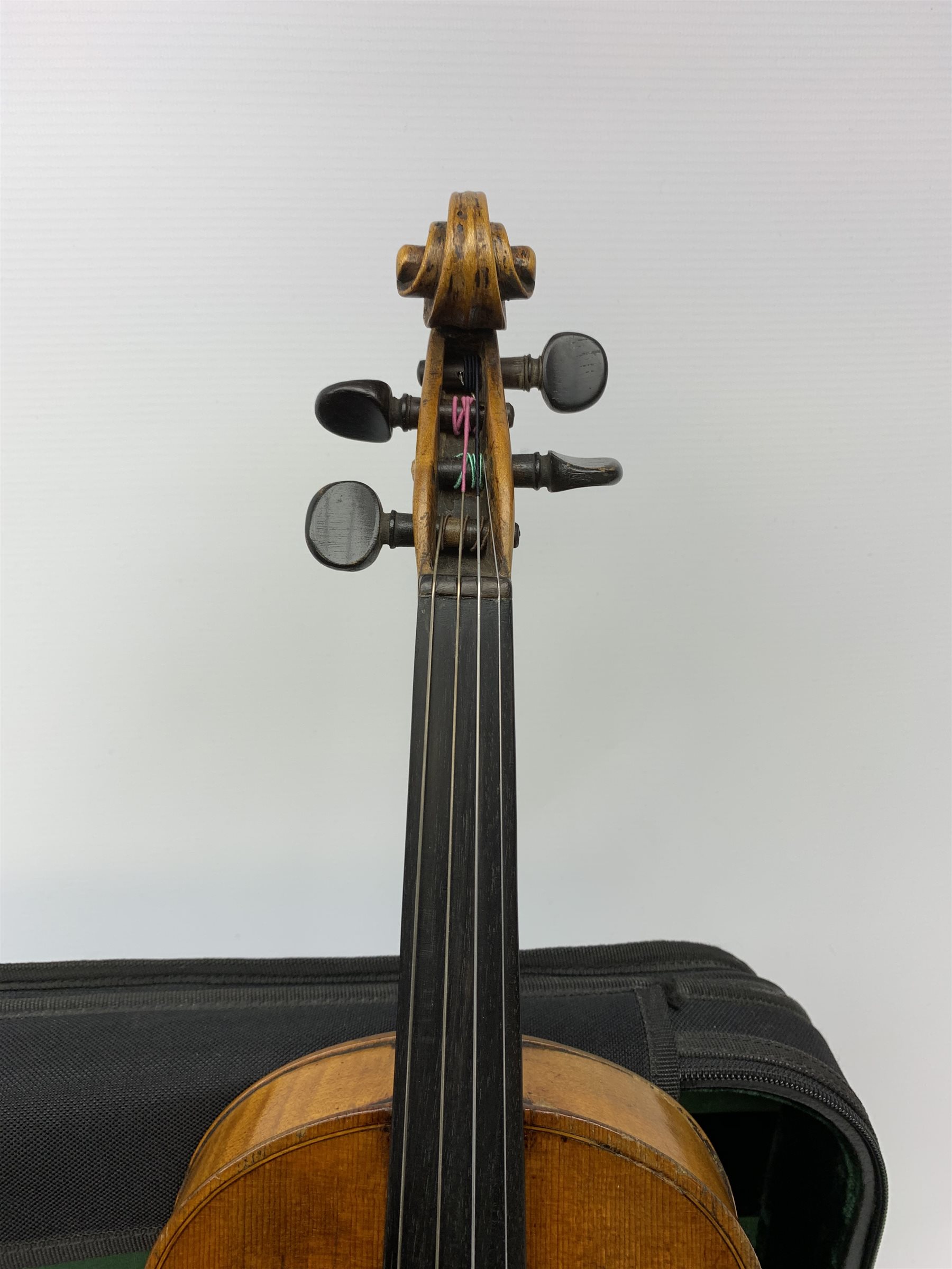 Late 19th century continental violin, possibly Italian, with 36cm two-piece maple back and ribs and spruce top, bears label 'Antonius Stradivarius Anno 1721', 60cm overall; in modern carrying case with silver mounted pernumbuco bow