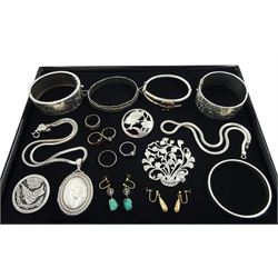 9ct gold jewellery including illusion set white sapphire ring, garnet ring and two pairs of screw back earrings and silver jewellery including locket, brooches, bangles and rings 