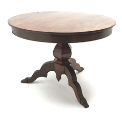  Victorian mahogany circular dining table, hexagonal baluster column, three shaped supports, D110cm, H74cm  