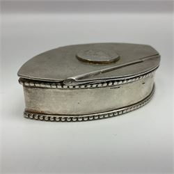 Plated snuff box set with a George IV coin dated 1828, with hinged cover and bead effect border 