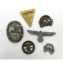 Six WW2 German badges - cap badge D.A.F. labour front; SS skull cap insignia First pattern 1925-35; Frauenschen Mother's Union; tank driver collar badge 1939-42; N.S.K.K. cycle corps; and officer's cap insignia 1940-42 (6)